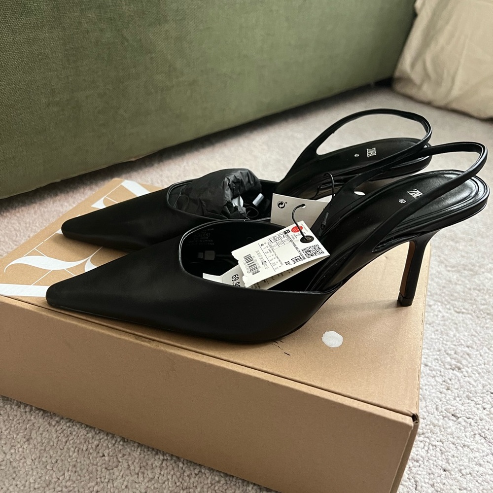NWT; size 9 (euro 40); black leather slingback heels